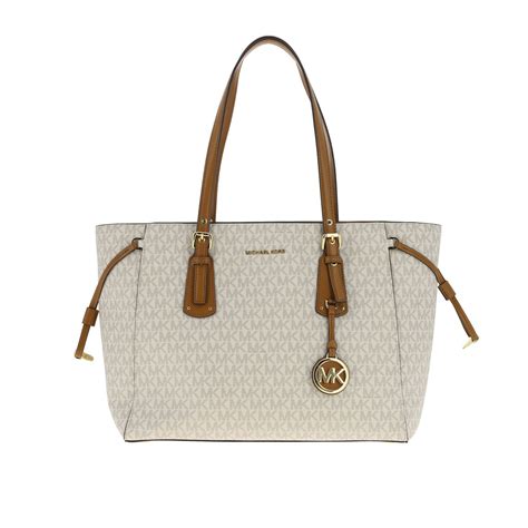 used michael kors cream tote|Michael Kors crossbody clearance.